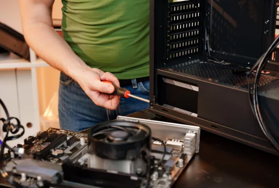 close-up-of-man-repairing-computer-system-unit