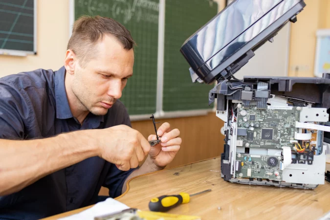 printer-repair-technician-a-male-handyman